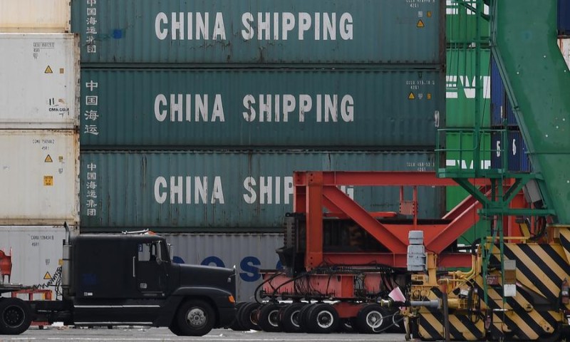 Разгрузка контейнеровоза в портовом терминале Лонг-Бич, штат Калифорния, 10 мая, поскольку переговоры по урегулированию торгового сражения между США и Китаем завершились в пятницу без результата, но и без разрыва. Фото: Марк Ралстон / AFP.